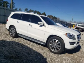 2016 Mercedes-Benz GL with VIN 4JGDF2EE2GA640355, listed as a Copart auction lot 87464054 with 144,996 mi miles and Salvage Title. Bid and sale history available at carsss.com. Image 4.
