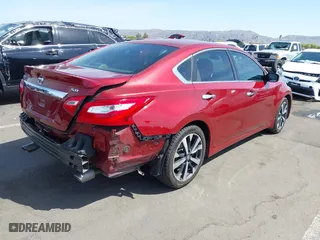2016 Nissan Altima 2.5 SL with VIN 1N4AL3AP4GC122089, listed as a IAAI auction lot 41965851 with 121,608 mi miles. Bid and sale history available at carsss.com. Image 4.