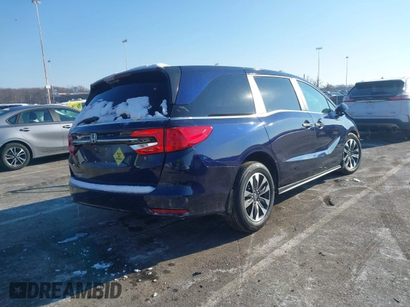 2024 Honda Odyssey EX-L with VIN 5FNRL6H60RB061017, listed as a IAAI auction lot 41399491 with 6,921 mi miles and . Bid and sale history available at DreamBid. Image 4.