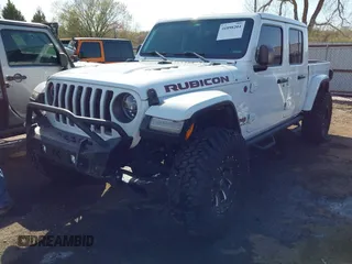 2021 Jeep Gladiator Rubicon with VIN 1C6JJTBG4ML536085, listed as a IAAI auction lot 41898204 with 39,627 mi miles and . Bid and sale history available at DreamBid. Image 17.