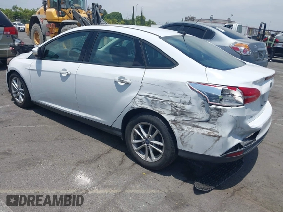 2017 Ford Focus SE with VIN 1FADP3F21HL217838, listed as a IAAI auction lot 42560331 with 154,406 mi miles and . Bid and sale history available at DreamBid. Image 3.