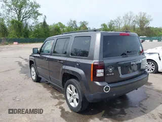 2014 Jeep Patriot Latitude with VIN 1C4NJRFB3ED847997, listed as a IAAI auction lot 42109140 with 121,299 mi miles and . Bid and sale history available at carsss.com. Image 3.