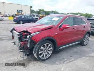 2021 Cadillac XT4 FWD Premium Luxury with VIN 1GYFZCR41MF043072, listed as a IAAI auction lot 41769251 with 31,053 mi miles. Bid and sale history available at carsss.com. Image 2.
