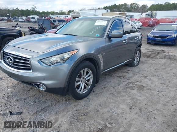 2015 Infiniti QX70 with VIN JN8CS1MWXFM480906, listed as a IAAI auction lot 41177811 with 176,527 mi miles and . Bid and sale history available at DreamBid. Image 2.