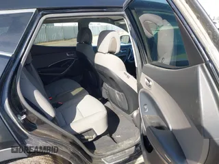 2016 Hyundai Santa Fe z VIN 5XYZT3LB6GG379054, wystawiony jako IAAI lot #42406174 z przebiegiem 182 073 mil mil oraz . Historia ofert i sprzedaży dostępna na DreamBid. Obrazek 8.