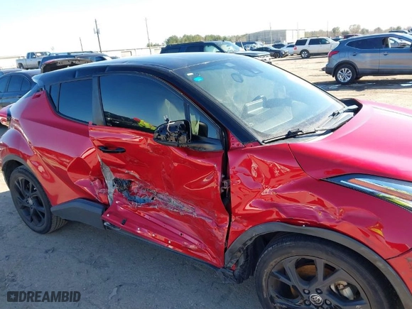 2021 Toyota C-HR LE with VIN JTNKHMBX2M1121238, listed as a IAAI auction lot 41417415 with 31,910 mi miles. Bid and sale history available at carsss.com. Image 6.