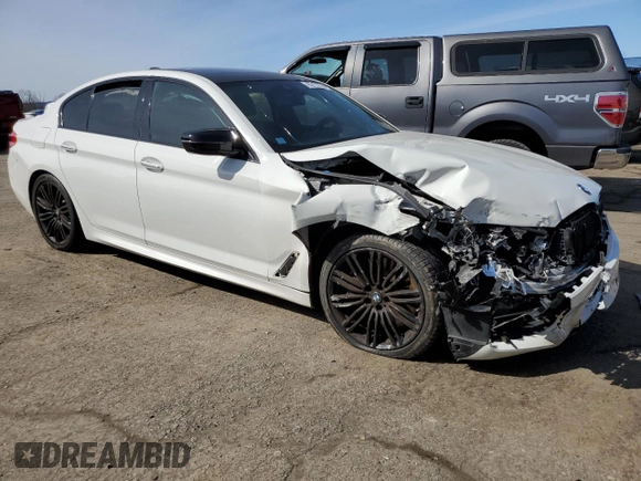 2018 BMW 5 Series M550i xDrive with VIN WBAJB9C54JB287422, listed as a Copart auction lot 46017034 with Not provided miles and Salvage title. Bid and sale history available at DreamBid. Image 4.