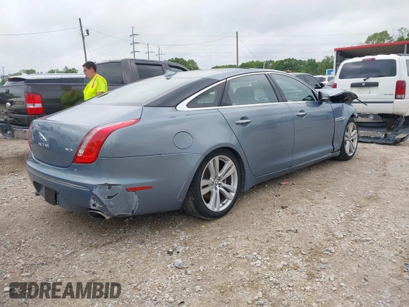 2013 Jaguar XJ with VIN SAJWA2G17DLV57561, listed as a IAAI auction lot 41928575 with 108,794 mi miles. Bid and sale history available at carsss.com. Image 4.