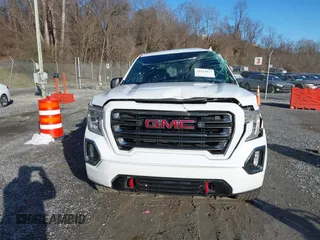 2021 GMC Sierra 1500 AT4 with VIN 3GTP9EEL1MG405564, listed as a IAAI auction lot 41214073 with 49,114 mi miles. Bid and sale history available at carsss.com. Image 12.