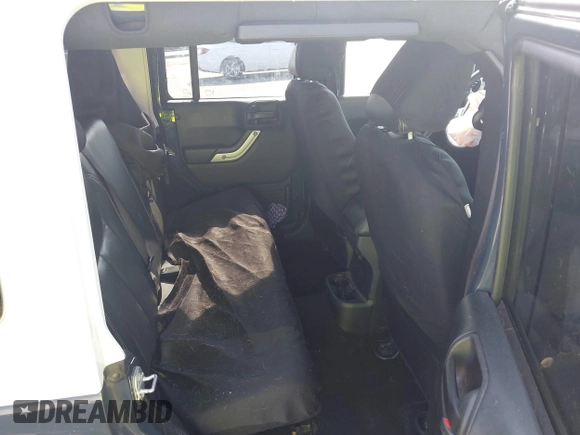 2017 Jeep Wrangler Unlimited Sahara with VIN 1C4HJWEG3HL648158, listed as a IAAI auction lot 42416132 with 95,954 mi miles and . Bid and sale history available at DreamBid. Image 8.