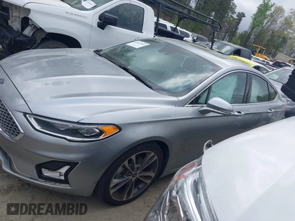 2020 Ford Fusion Titanium с VIN 3FA6P0K91LR128016, выставлен на аукционе IAAI как лот 41947905 с пробегом 79 622 миль миль и . История ставок и продаж доступна на DreamBid. Изображение 14.