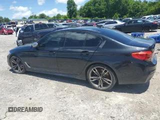 2019 BMW 5 Series M550i xDrive with VIN WBAJB9C53KB289356, listed as a Copart auction lot 57814535 with 60,454 mi miles and Clean title. Bid and sale history available at DreamBid. Image 2.