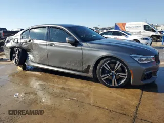 2019 BMW 7 Series 750i with VIN WBA7F0C59KGM25051, listed as a Copart auction lot 87285534 with Not Provided miles and Salvage Title. Bid and sale history available at DreamBid. Image 4.