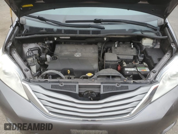 2014 Toyota Sienna XLE with VIN 5TDYK3DC1ES492724, listed as a Copart auction lot 51605245 with 112,079 mi miles and Salvage Title. Bid and sale history available at carsss.com. Image 14.