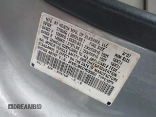 2007 Honda Odyssey EX-L with VIN 5FNRL38627B055862, listed as a IAAI auction lot 42148442 with 225,627 mi miles. Bid and sale history available at carsss.com. Image 9.