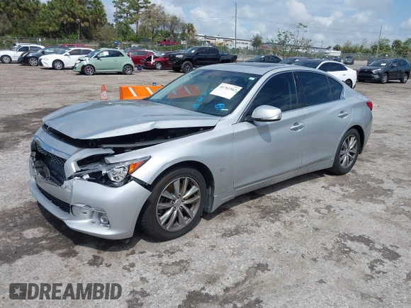 2014 Infiniti Q50 Premium z VIN JN1BV7AP9EM690381, wystawiony jako IAAI lot #41761562 z przebiegiem 107 099 mil mil oraz . Historia ofert i sprzedaży dostępna na DreamBid. Obrazek 17.