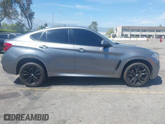 2018 BMW X6 xDrive35i z VIN 5UXKU2C51J0X50913, wystawiony jako IAAI lot #42078443 z przebiegiem Nie podano mil oraz . Historia ofert i sprzedaży dostępna na DreamBid. Obrazek 12.