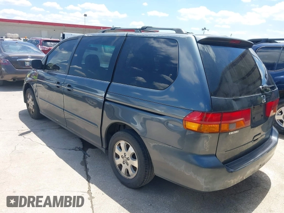 2004 Honda Odyssey EX-L with VIN 5FNRL18974B059223, listed as a IAAI auction lot 42249508 with 247,856 mi miles and . Bid and sale history available at DreamBid. Image 3.