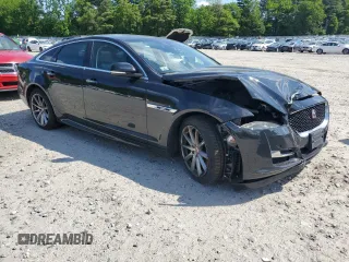 2016 Jaguar XJ R-Sport z VIN SAJWJ1CD8G8V95608, wystawiony jako Copart lot #59103615 z przebiegiem 119 066 mil mil oraz Szkoda całkowita • Salvage title. Historia ofert i sprzedaży dostępna na DreamBid. Obrazek 4.