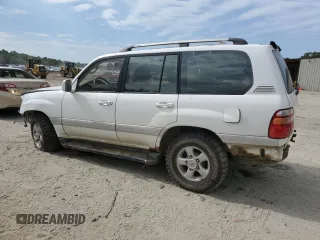 1999 Toyota Land Cruiser z VIN JT3HT05J5X0050404, wystawiony jako Copart lot #56066125 z przebiegiem 385 659 mil mil oraz Tytuł czysty. Historia ofert i sprzedaży dostępna na DreamBid. Obrazek 2.