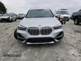 2020 BMW X1 xDrive28i with VIN WBXJG9C05L5P76067, listed as a Copart auction lot 40635893 with 57,184 mi miles. Bid and sale history available at carsss.com. Image 5.