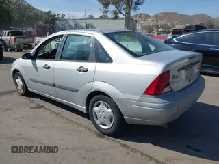 2003 Ford Focus LX with VIN 1FAFP33P53W109559, listed as a IAAI auction lot 42087949 with 268,456 mi miles and . Bid and sale history available at carsss.com. Image 3.