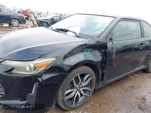 2014 Scion tC with VIN JTKJF5C74E3069104, listed as a IAAI auction lot 41579797 with 130,668 mi miles. Bid and sale history available at carsss.com. Image 6.