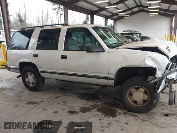 1998 GMC Yukon with VIN 1GKEK13R7WJ700881, listed as a IAAI auction lot 41507538 with 188,396 mi miles. Bid and sale history available at carsss.com. Image 13.