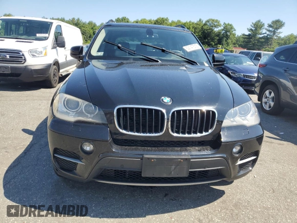 2012 BMW X5 35i with VIN 5UXZV4C54CL752079, listed as a Copart auction lot 62147515 with 147,244 mi miles and Clean title. Bid and sale history available at DreamBid. Image 5.