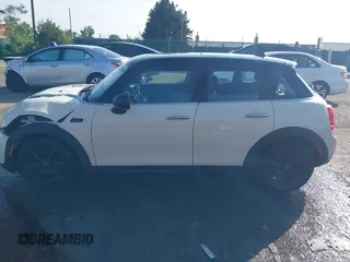 2019 MINI Hardtop 4 Door Cooper with VIN WMWXU1C5XK2J02832, listed as a IAAI auction lot 42525235 with 68,296 mi miles and . Bid and sale history available at DreamBid. Image 14.
