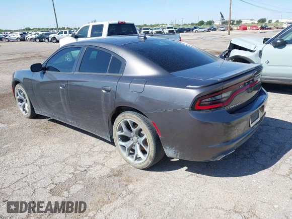 2015 Dodge Charger SXT with VIN 2C3CDXHG9FH825135, listed as a IAAI auction lot 42172793 with 169,324 mi miles and . Bid and sale history available at DreamBid. Image 3.