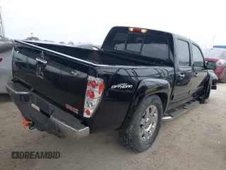 2012 GMC Canyon with VIN 1GTH5PFE0C8162961, listed as a IAAI auction lot 41635311 with 198,553 mi miles and . Bid and sale history available at DreamBid. Image 4.