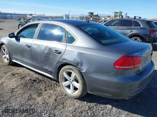 2012 Volkswagen Passat SE with VIN 1VWBP7A31CC008775, listed as a IAAI auction lot 41353437 with 118,815 mi miles. Bid and sale history available at carsss.com. Image 3.