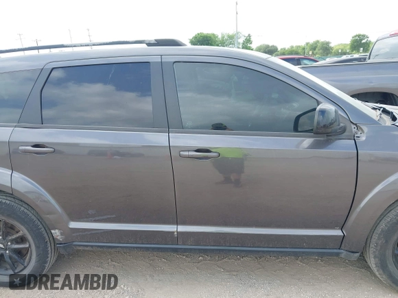 2019 Dodge Journey SE with VIN 3C4PDCBBXKT860142, listed as a IAAI auction lot 42126997 with 101,675 mi miles and . Bid and sale history available at DreamBid. Image 13.
