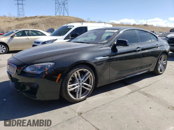 2015 BMW 6 Series 650i xDrive with VIN WBA6B4C55FD761124, listed as a Copart auction lot 50559555 with 49,735 mi miles and Salvage Title. Bid and sale history available at DreamBid. Image 1.