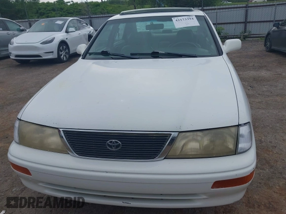 1997 Toyota Avalon XL with VIN 4T1BF12B7VU151537, listed as a IAAI auction lot 42173394 with 196,442 mi miles and . Bid and sale history available at DreamBid. Image 12.