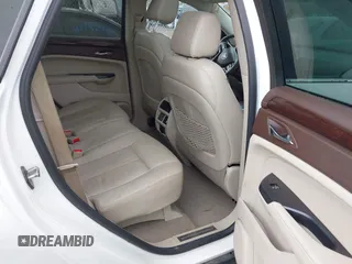 2014 Cadillac SRX Performance Collection with VIN 3GYFNCE34ES519059, listed as a IAAI auction lot 42237351 with 80,578 mi miles and . Bid and sale history available at DreamBid. Image 8.