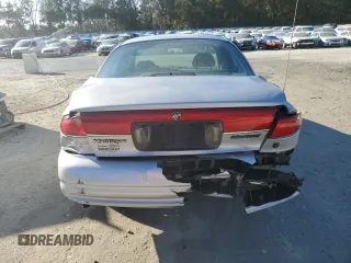 1998 Mercury Mystique z VIN 1MELM6534WK600653, wystawiony jako Copart lot #45148215 z przebiegiem 122 878 mil mil oraz Szkody całkowita. Historia ofert i sprzedaży dostępna na DreamBid. Obrazek 6.