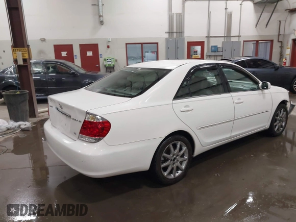 2005 Toyota Camry LE with VIN 4T1BF30KX5U083054, listed as a IAAI auction lot 41814022 with 195,608 mi miles and . Bid and sale history available at DreamBid. Image 4.