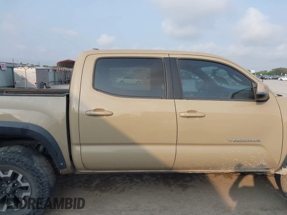 2017 Toyota Tacoma SR5 with VIN 5TFCZ5AN7HX097307, listed as a IAAI auction lot 42337528 with 98,000 mi miles and . Bid and sale history available at DreamBid. Image 13.