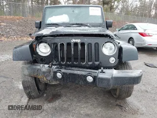 2016 Jeep Wrangler Unlimited 75th Anniversary with VIN 1C4HJWEG3GL181371, listed as a IAAI auction lot 41864965 with 64,259 mi miles and . Bid and sale history available at DreamBid. Image 12.