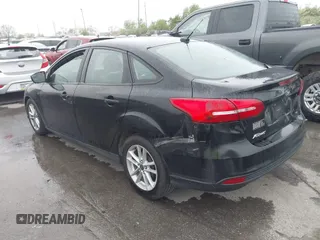 2016 Ford Focus SE with VIN 1FADP3F22GL229348, listed as a IAAI auction lot 42169543 with 173,818 mi miles and . Bid and sale history available at DreamBid. Image 3.