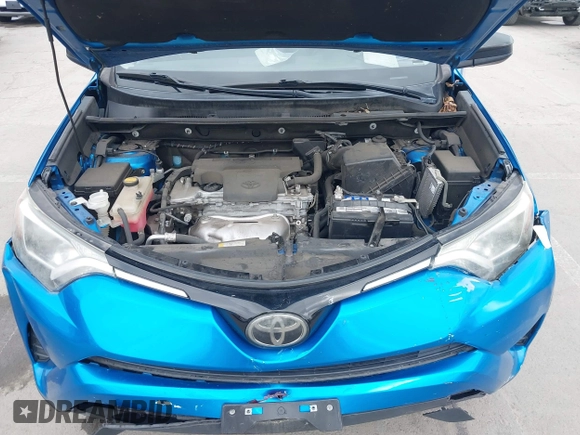 2018 Toyota RAV4 LE with VIN 2T3BFREV6JW740214, listed as a IAAI auction lot 42106349 with 105,831 mi miles and . Bid and sale history available at carsss.com. Image 10.