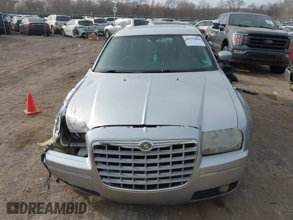2005 Chrysler 300 with VIN 2C3JA53G85H159623, listed as a IAAI auction lot 41773424 with 127,764 mi miles. Bid and sale history available at carsss.com. Image 10.