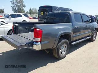 2016 Toyota Tacoma SR5 with VIN 5TFAX5GN7GX055884, listed as a IAAI auction lot 41943589 with 85,443 mi miles. Bid and sale history available at carsss.com. Image 4.