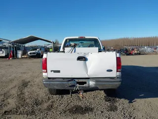 1999 Ford Super Duty F-250 XL with VIN 1FTNX21F4XED35890, listed as a IAAI auction lot 41420623 with 214,432 mi miles. Bid and sale history available at carsss.com. Image 16.