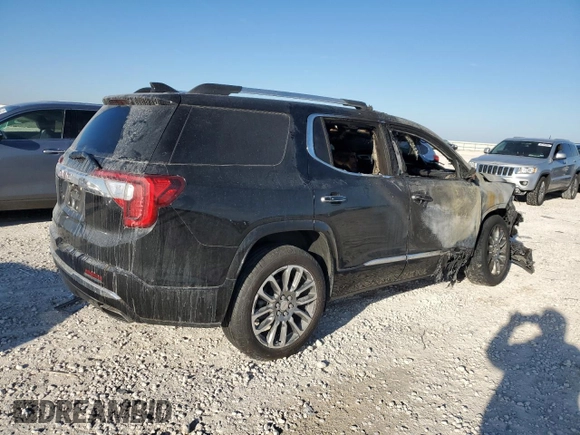 2023 GMC Acadia Denali with VIN 1GKKNPLS2PZ100983, listed as a Copart auction lot 42134825 with Not provided miles and Salvage title. Bid and sale history available at DreamBid. Image 3.