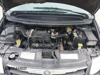 2006 Chrysler Town & Country LWB LX with VIN 2A4GP44R06R604215, listed as a IAAI auction lot 39411993 with 289,048 mi miles. Bid and sale history available at carsss.com. Image 10.