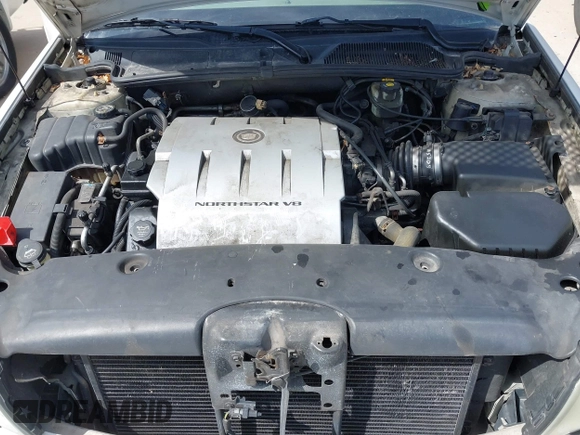 2004 Cadillac DeVille z VIN 1G6KD54Y04U102197, wystawiony jako IAAI lot #41940502 z przebiegiem Nie podano mil oraz . Historia ofert i sprzedaży dostępna na DreamBid. Obrazek 10.