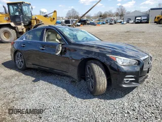 2015 Infiniti Q50 Premium with VIN JN1BV7AR4FM390914, listed as a Copart auction lot 50402405 with 142,605 mi miles and Salvage Title. Bid and sale history available at DreamBid. Image 4.
